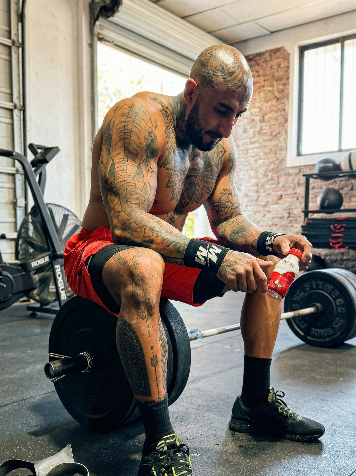 CrossFit athlete with LifeBeat 5,000 mg liquid L-arginine supplement in the USA